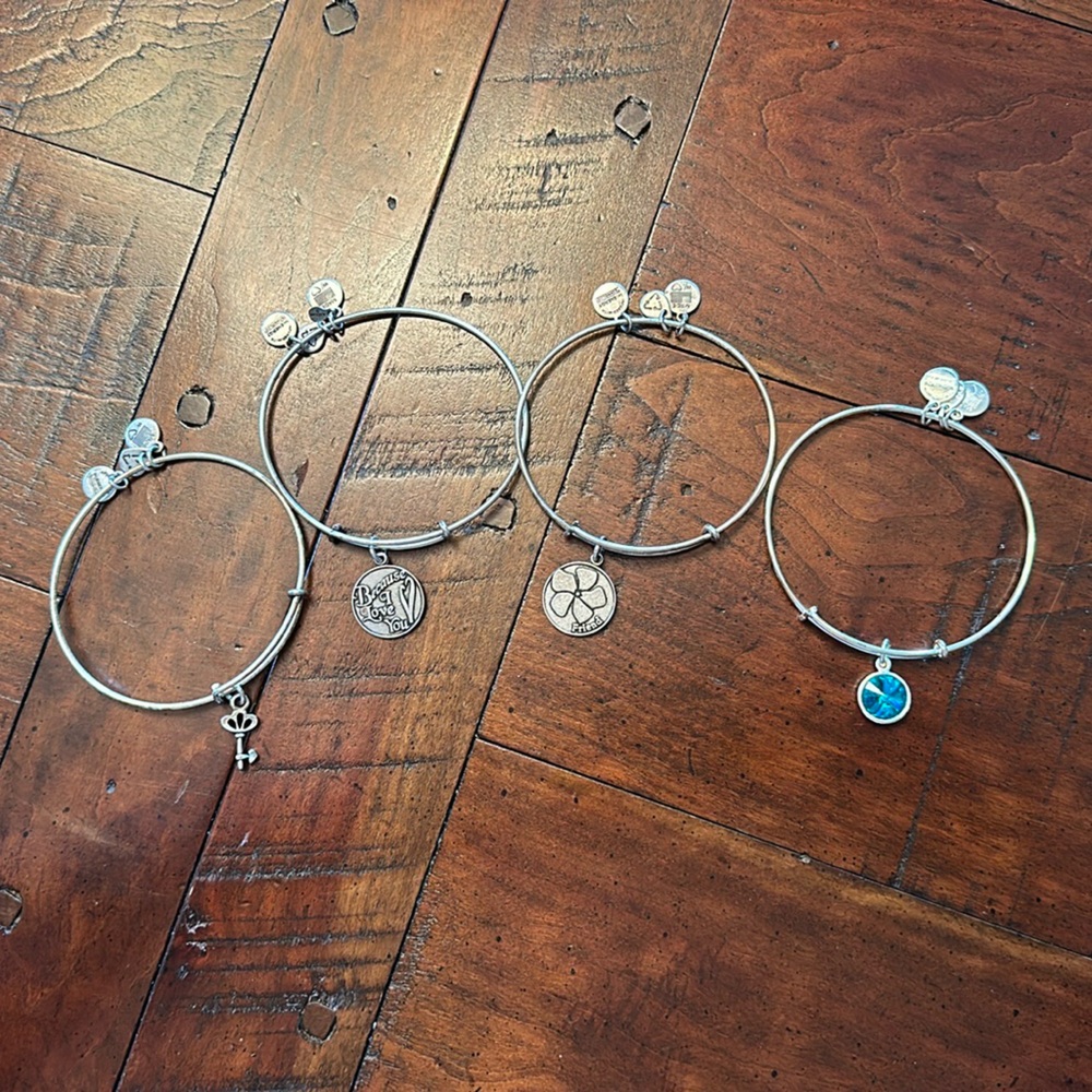 4 Alex & Ani bracelets: Friend, Because I Love You, a key, & a blue crystal